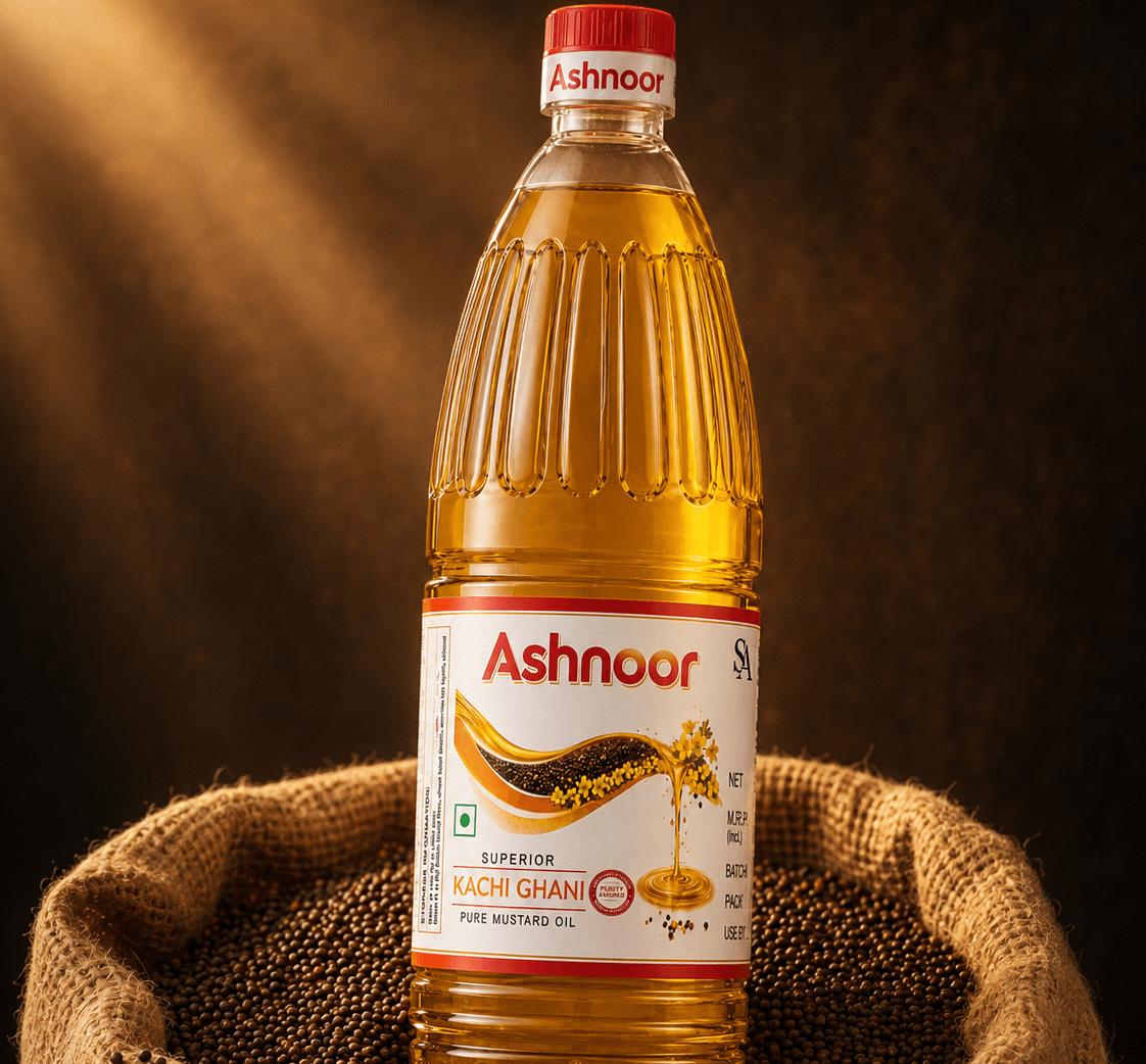 Ashnoor Kachi Ghani bottle standing in a jute sack of black mustard seeds